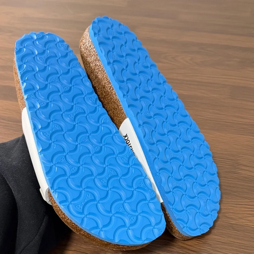 Birkenstock Women’s White‎ Sandals with Blue Outsole